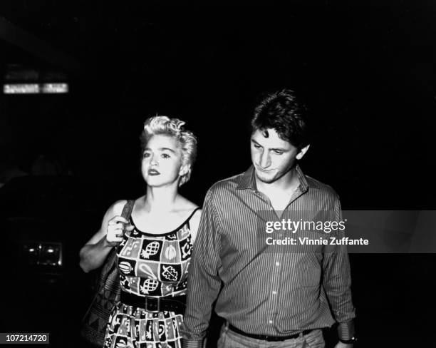Acting couple Madonna and Sean Penn leave rehearsals for their play 'Goose and Tom Tom' in August 1986 in New York City, New York.