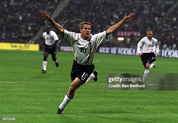 Michael Owen of England celebrates after scoring a goal during the FIFA 2002 World Cup Qualifier against Germany played at the Olympic Stadium in...