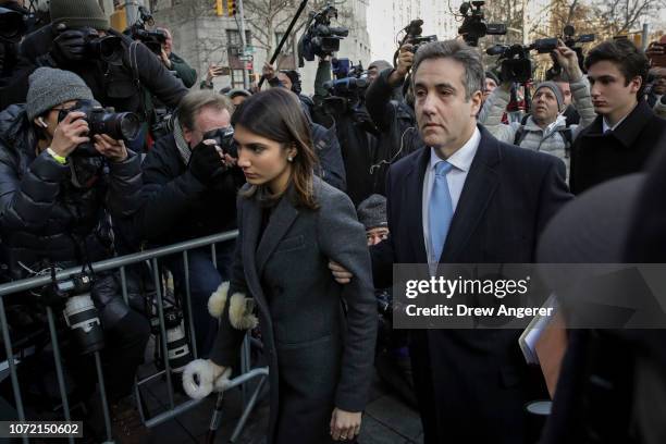 Michael Cohen, President Donald Trump's former personal attorney and fixer, arrives with his family at federal court for his sentencing hearing on...