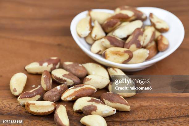 brazil nuts - brazil nuts stock pictures, royalty-free photos & images