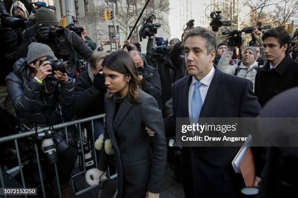 Michael Cohen, President Donald Trump's former personal attorney and fixer, arrives with his family at federal court for his sentencing hearing on...