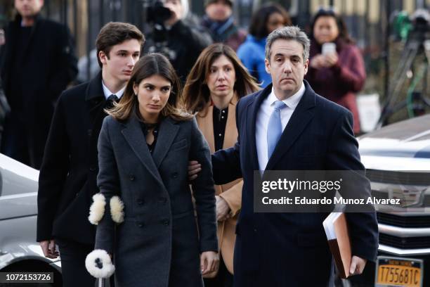 Michael Cohen, President Donald Trump's former personal attorney and fixer, arrives with his family at federal court for his sentencing hearing,...