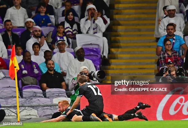 Team Wellington's midfielder Aaron Clapham celebrates his goal during the opening match of the FIFA Club World Cup 2018 football tournament between...