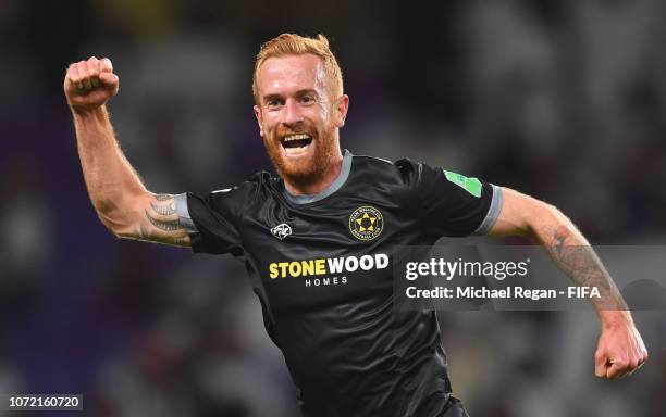 Aaron Clapham of Team Wellington celebrates after scoring his team's second goal during the FIFA Club World Cup first round play-off match between Al...