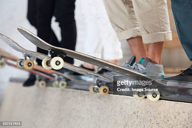 skaters and their boards - skate bildbanksfoton och bilder
