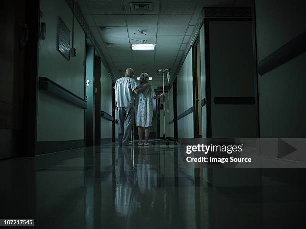 female patient with intravenous drip - nurse hospital dark stock pictures, royalty-free photos & images
