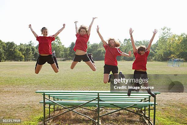 girl soccer players jumping off bleachers - chatham new york state stock pictures, royalty-free photos & images