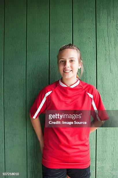 portrait of a girl soccer player - soccer jerseys stock pictures, royalty-free photos & images