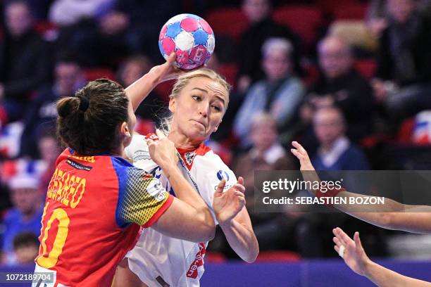 Norway's center back Stine Bredal Oftedal tries to shoot during the Euro 2018 European Women's Handball Championship Group 2 main round match between...