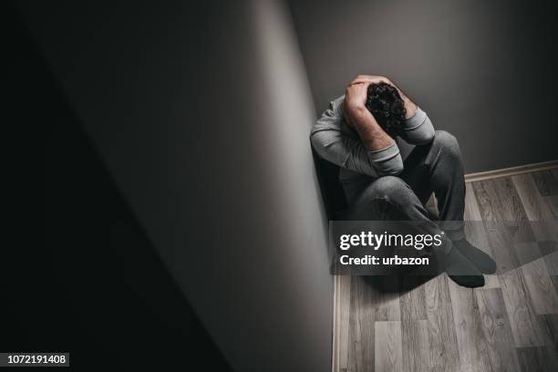 depressive man - anxiety disorder stock pictures, royalty-free photos & images