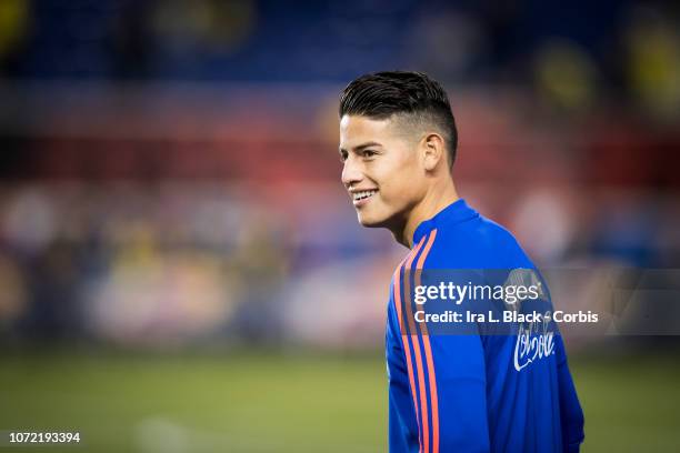 James Rodríguez of Colombia smiles as he warms up at the start of the International Friendly match between Columbia and Costa Rica at Red Bull Arena...