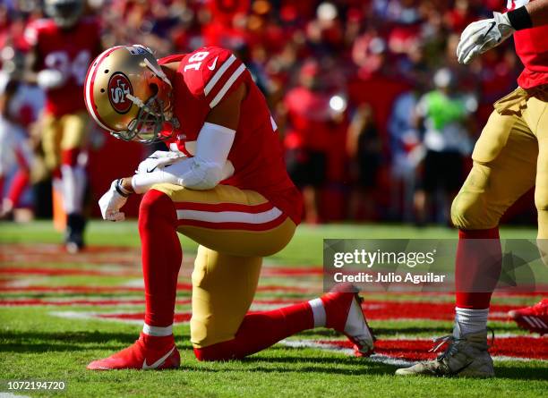 Dante Pettis of the San Francisco 49ers celebrates after catching a 13-yard pass for a touchdown in the second quarter against the Tampa Bay...