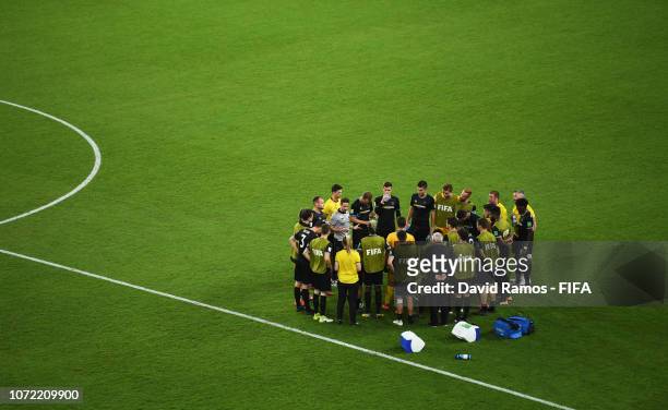 Team Wellington players prepare for extra time during the FIFA Club World Cup first round play-off match between Al Ain FC and Team Wellington FC at...