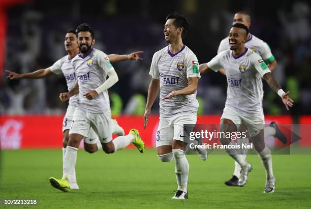 Tsukasa Shiotani of Al Ain and team mates celebrate penalty shoot out victory in the FIFA Club World Cup first round play-off match between Al Ain FC...