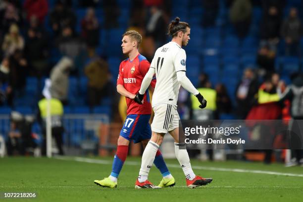 Gareth Bale of Real Madrid crosses paths with Arnor Sigurdsson following the UEFA Champions League Group G match between Real Madrid and CSKA Moscow...