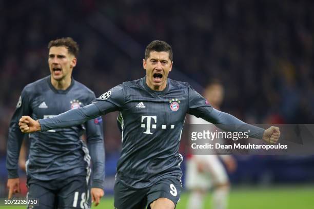 Robert Lewandowski of Bayern Munich scores his sides second goal during the UEFA Champions League Group E match between Ajax and FC Bayern Muenchen...