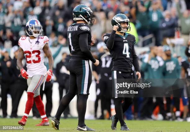 Jake Elliott of the Philadelphia Eagles celebrates his game winning field goal in the final minutes of the game with teammate Cameron Johnston as...