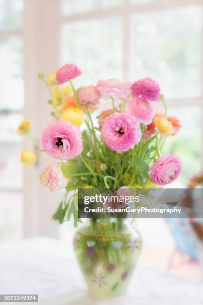 colorful ranunculus flowers in vase - ranunculus bildbanksfoton och bilder