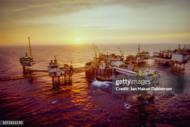 oil production platform in the north sea - mining natural resources fotografías e imágenes de stock