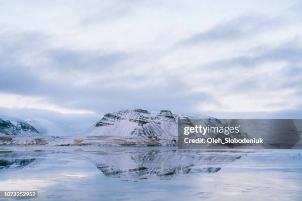 scenic view of fjord in winter at sunset in iceland - westfjords iceland stock pictures, royalty-free photos & images