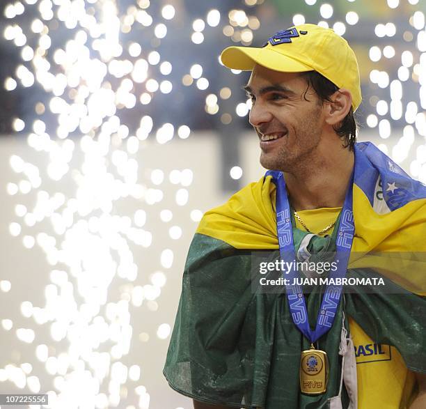 Brazilian captain Giba smiles during the awards ceremony after defeating Russia in the World League 2010 final volleyball match at Orfeo Superdomo...
