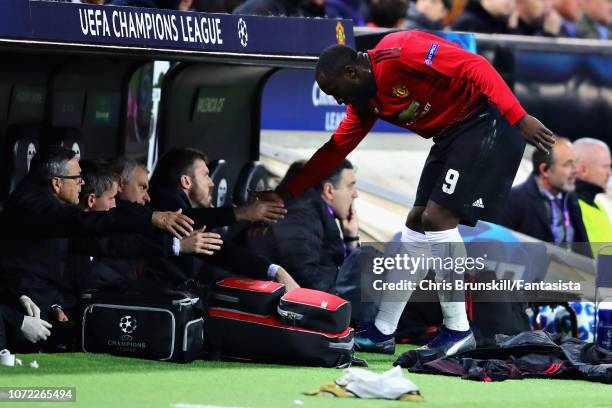 Romelu Lukaku of Manchester United shakes hands with Manager of Manchester United Jose Mourinho after being substituted during the UEFA Champions...