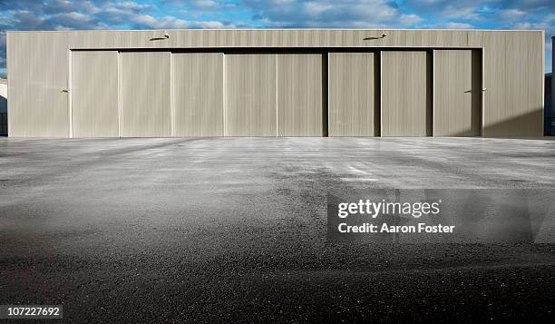 hanger background - airplane hangar stock pictures, royalty-free photos & images