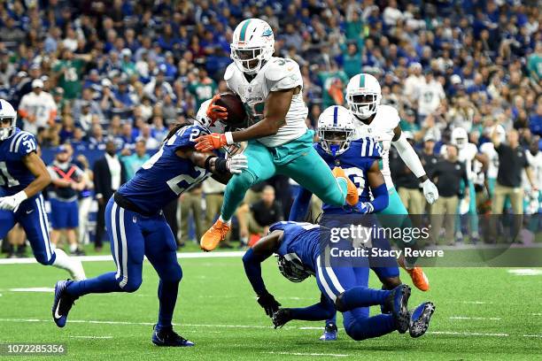 Kenyan Drake of the Miami Dolphins runs for a touchdown in the game against the Indianapolis Colts in the fourth quarter at Lucas Oil Stadium on...