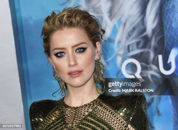 Actress Amber Heard arrives for the world premiere of "Aquaman" at the TCL Chinese theatre in Hollywood on December 12, 2018.