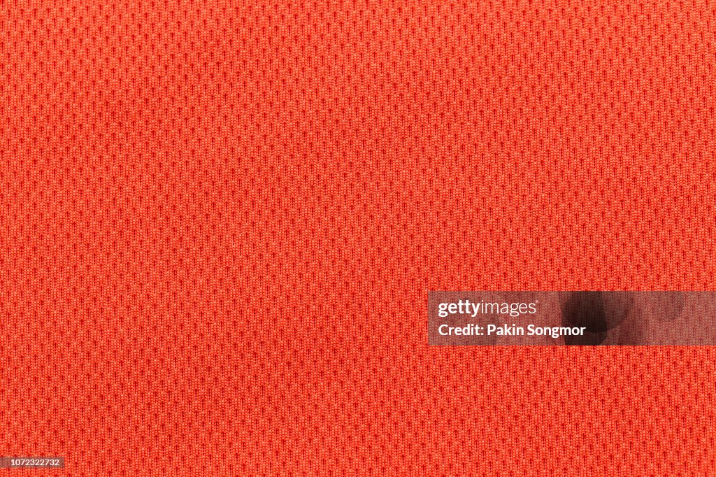 Close up Orange or Red fabric texture. Textile background.
