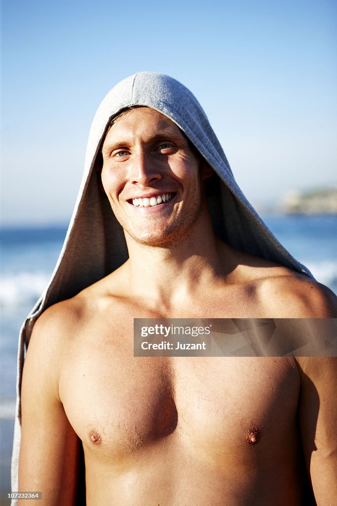 Portrait of young man wearing a hooded top