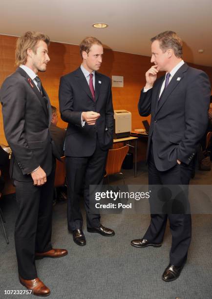 England 2018 Bid Ambassador David Beckham, Prince William and British Prime Minister David Cameron during a reception at the Steigenberger hotel a...