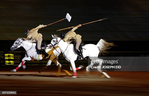 Mounted Omani soldiers show their skills on the third day of celebrations marking 40 years since Omani ruler Sultan Qaboos bin Said took the throne...