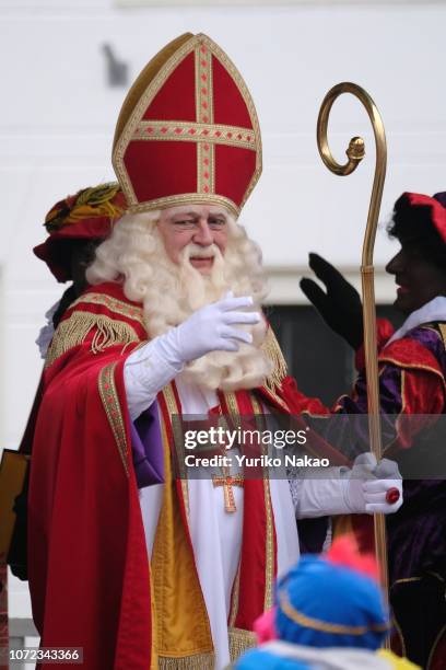 Sinterklaas and Zwarte Piet or Black Pete are greeted by people upon their arrival November 24 in Katwijk, Netherlands. Recently, the traditional...