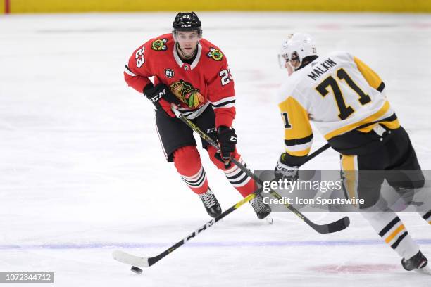 Chicago Blackhawks defenseman Brandon Manning battles with Pittsburgh Penguins center Evgeni Malkin in second period action of an NHL game between...