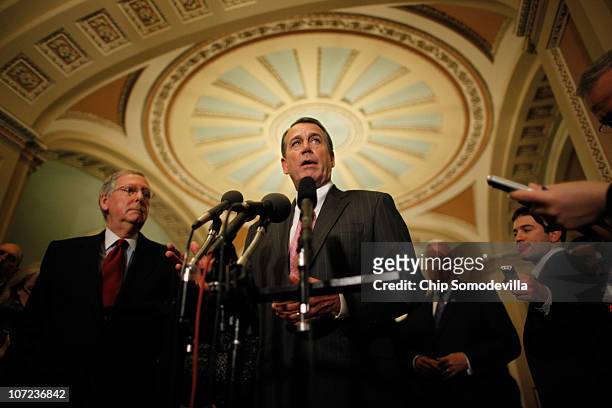 House Minority Leader John Boehner and Senate Minority Leader Mitch McConnell talk with reporters after meeting with Republican governors-elect, at...