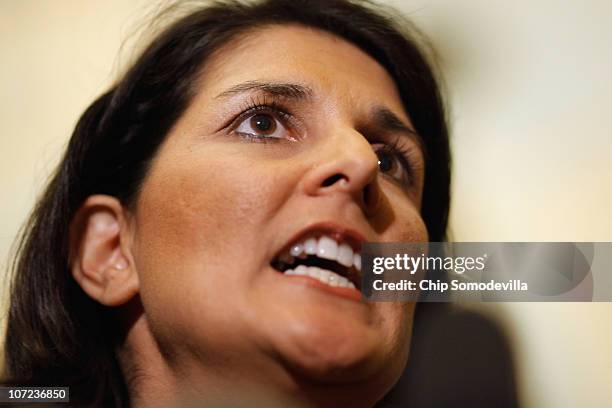 South Carolina Governor-elect Kikki Haley talks to reporters after meeting with House Minority Leader John Boehner and Senate Minority Leader Mitch...