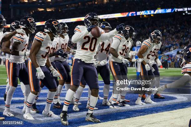 Corner back Kyle Fuller and Prince Amukamara of the Chicago Bears celebrates his interception in the fourth quarter with other teammates of the...