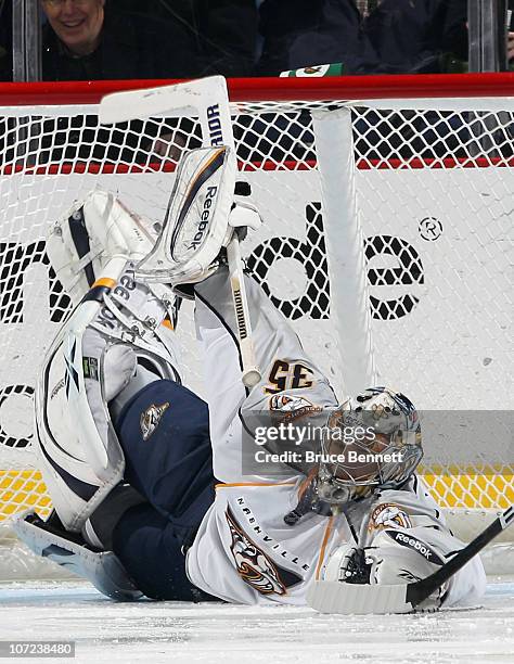 Pekka Rinne of the Nashville Predators comes up with the puck during third period action against the Columbus Blue Jackets at the Nationwide Arena on...