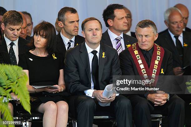 Prime Minister John Key with his wife Bronagh and Greymouth Major Tony Kokshoorn pay their respect at a national memorial service for the 29 miners...