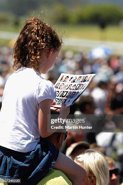 Young girl reads the Pike River Mine Official Remembrance Service booklet at a national memorial service for the 29 miners that lost their lives in...