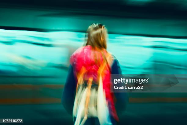 girl standing on a platform. - girls on train track stock pictures, royalty-free photos & images