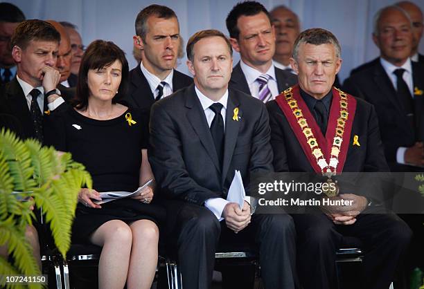 Prime Minister John Key with his wife Bronagh and Greymouth Major Tony Kokshoorn pay their respect at a national memorial service for the 29 miners...