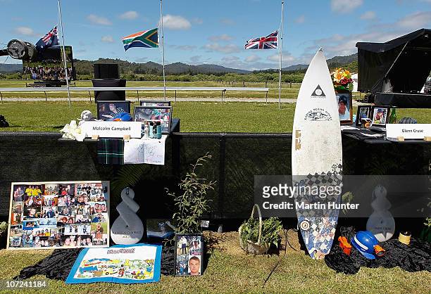 Personal items and photos of the late miners are displayed at a national memorial service for the 29 miners that lost their lives in the Pike River...