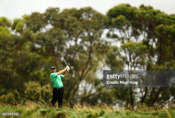 Rod Pampling of Australia plays out of the rough during day one of the Australian Open at The Lakes Golf Club on December 2, 2010 in Sydney,...