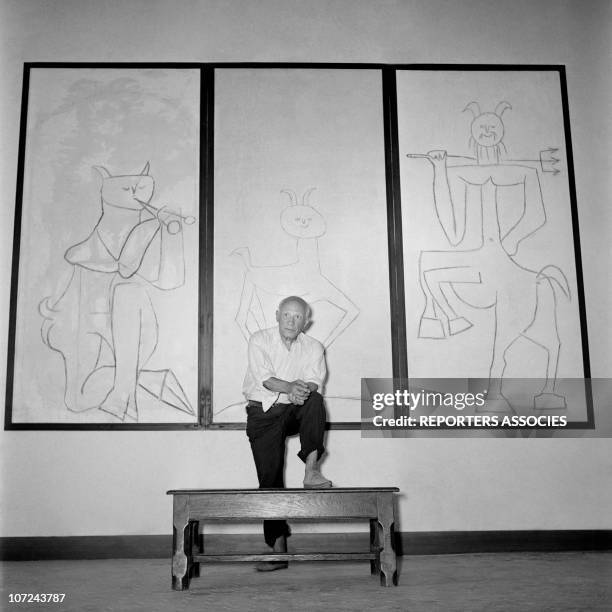 Pablo Picasso poses at the opening of his ceramics exhibition at the Antibes museum, today known as the Picasso Museum, the first museum in the world...