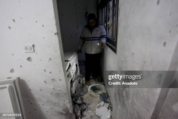 Palestinians inspect the house of Ashraf Nawla who was shot dead during an attempt to arrest him, in Nablus, West Bank on December 13, 2018. Israeli...