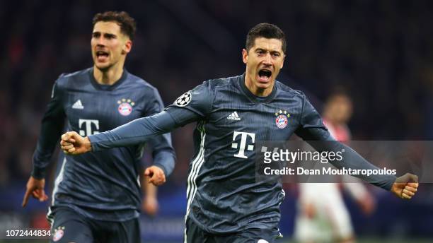 Robert Lewandowski of Bayern Muenchen celebrates scoring his teams second goal of the game during the UEFA Champions League Group E match between...
