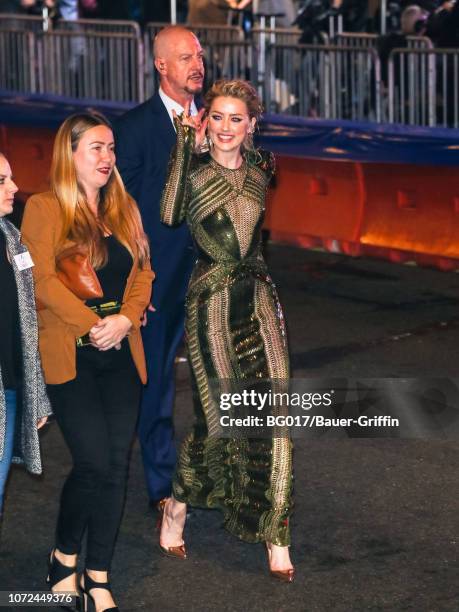 Amber Heard is seen arriving at the premiere of Warner Bros. Pictures' 'Aquaman' at the Chinese Theatre on December 12, 2018 in Los Angeles,...