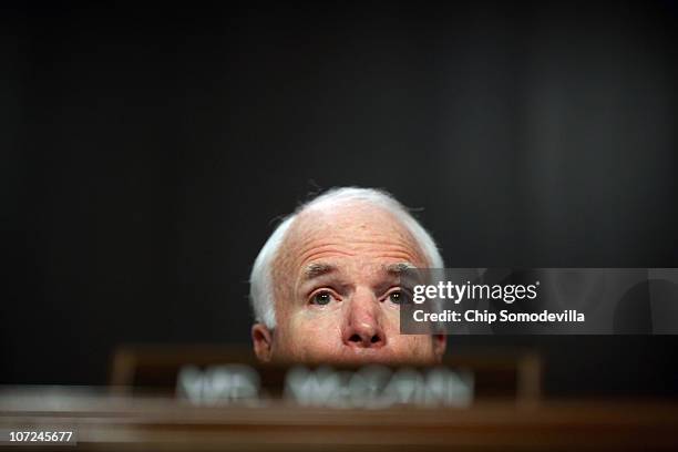 Senate Armed Services Committee ranking member Sen. John McCain delivers opening remarks during a hearing about the military's "don't ask, don't...